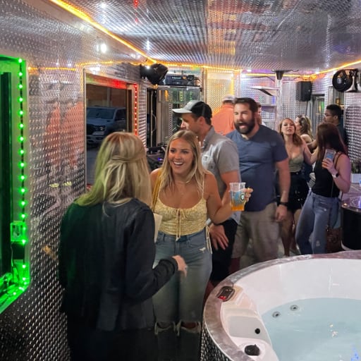 Partying inside the Big Johnson Party Tub